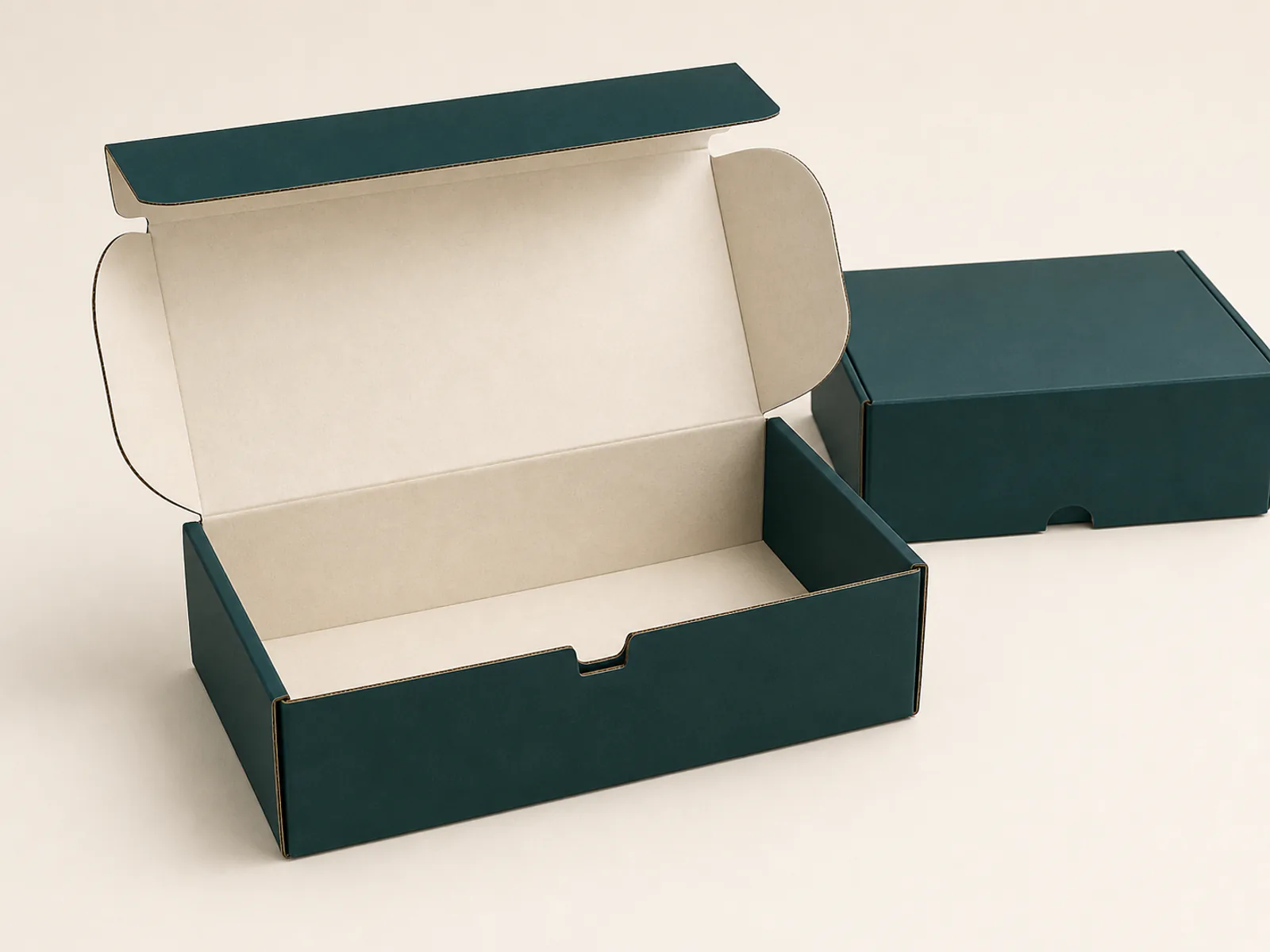 Corrugated mailer box open to show locking tabs dust flaps and protective paper fit